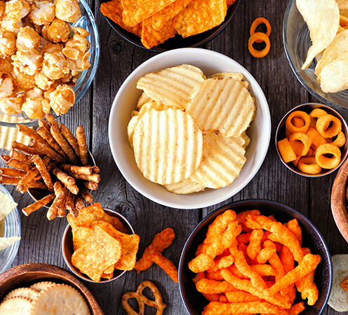 Snack food manufacturing raw materials: frying oils, crisping starches, seasonings